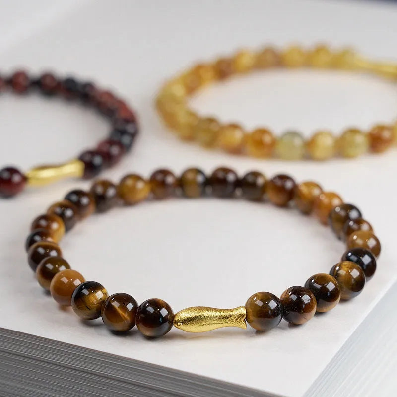 Handmade tigereye beaded bracelet with small fish pendant, natural stone beads, multiple colour options including golden tiger eye