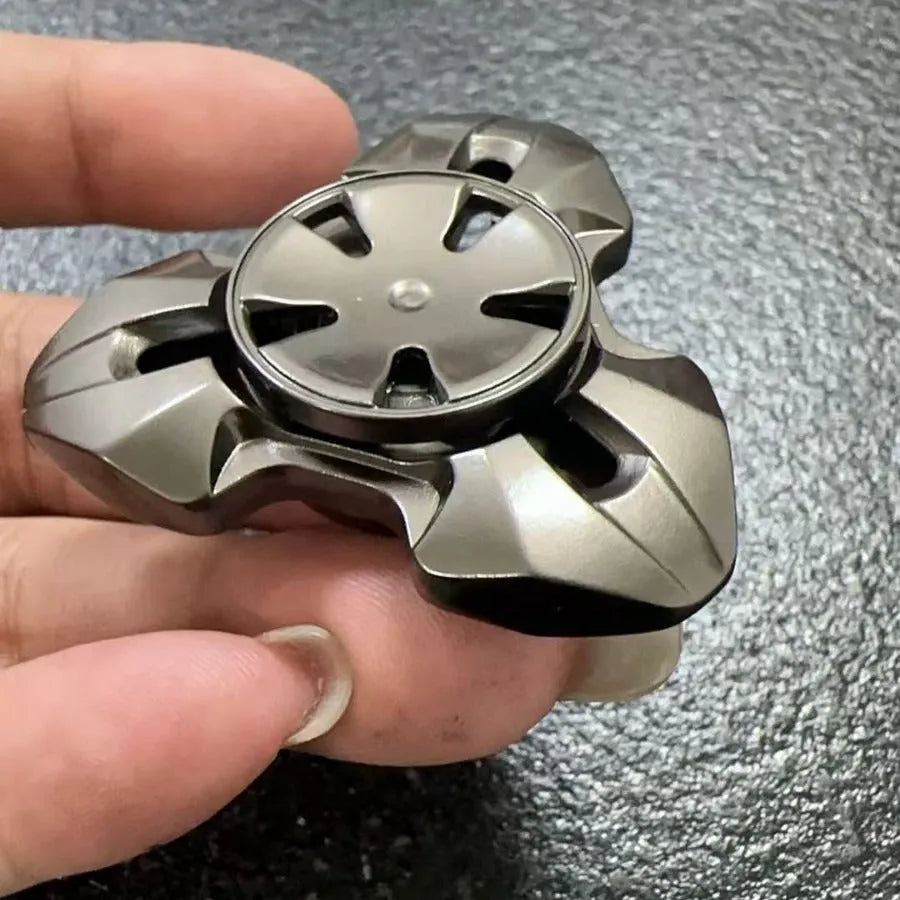 Alloy rotating fingertip gyro decompression toy in gun colour and colourful options