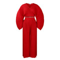 Women's African print two-piece suit set with batwing sleeve blouse and wide leg trousers in red.