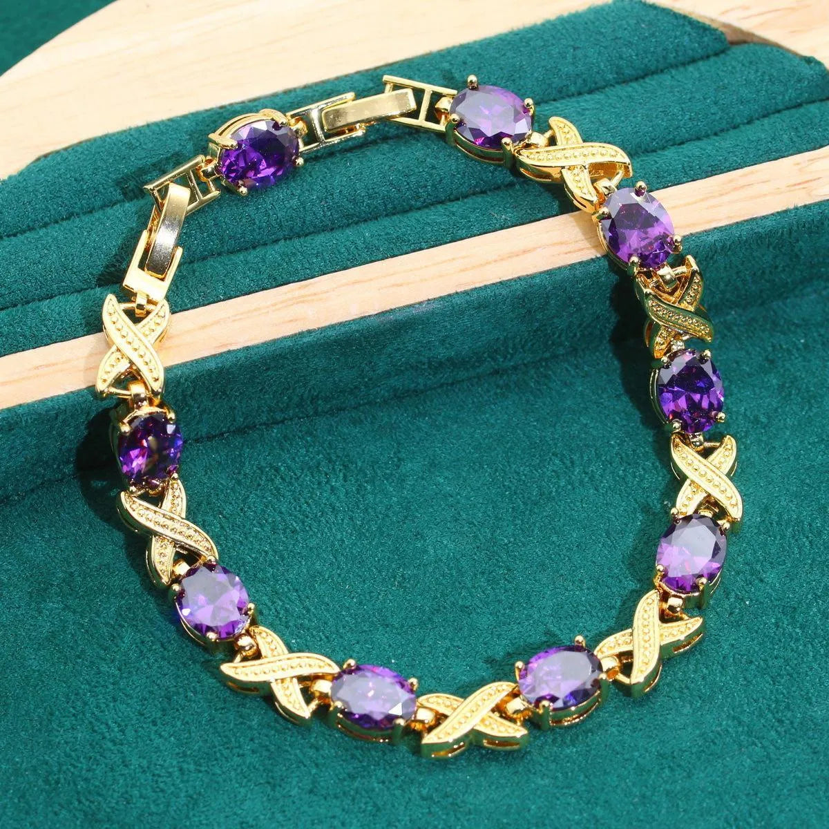 18k gold plated jewellery set with multi-colour cubic zirconia stones, showing necklace, earrings, ring, and bracelet.