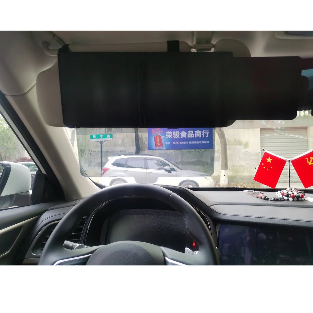 Retractable PU leather car sunshade in black 31x15cm on a vehicle window