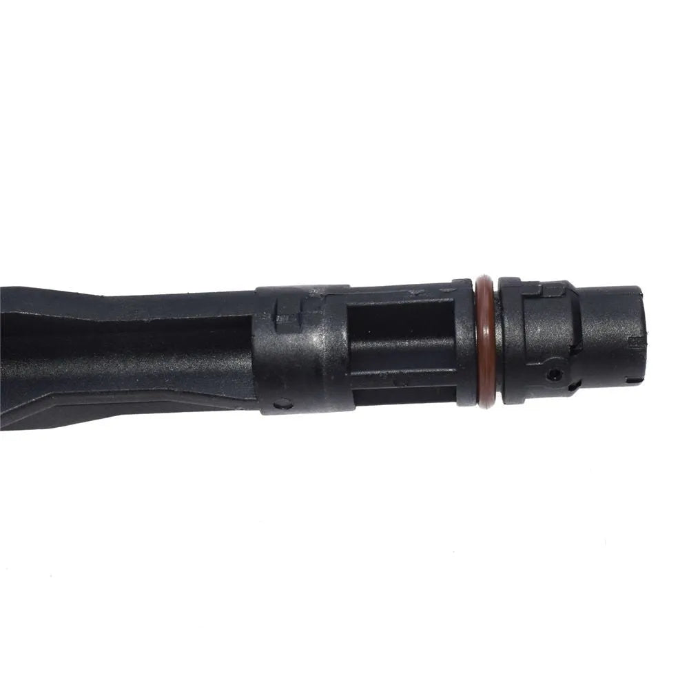 Black General Motors car sensor replacement part on a white background.