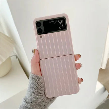 Samsung Z Flip3 folding phone in a slim, solid-colour flip case showing front and back views.