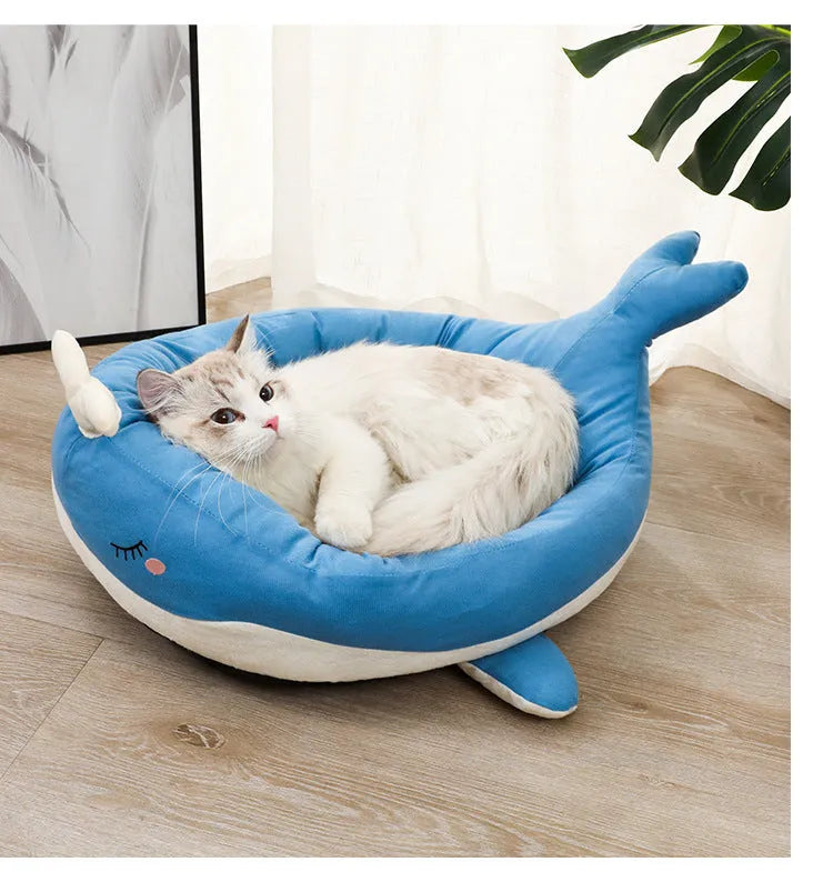 Blue duck-shaped fluffy pet bed for small dogs and cats on floor