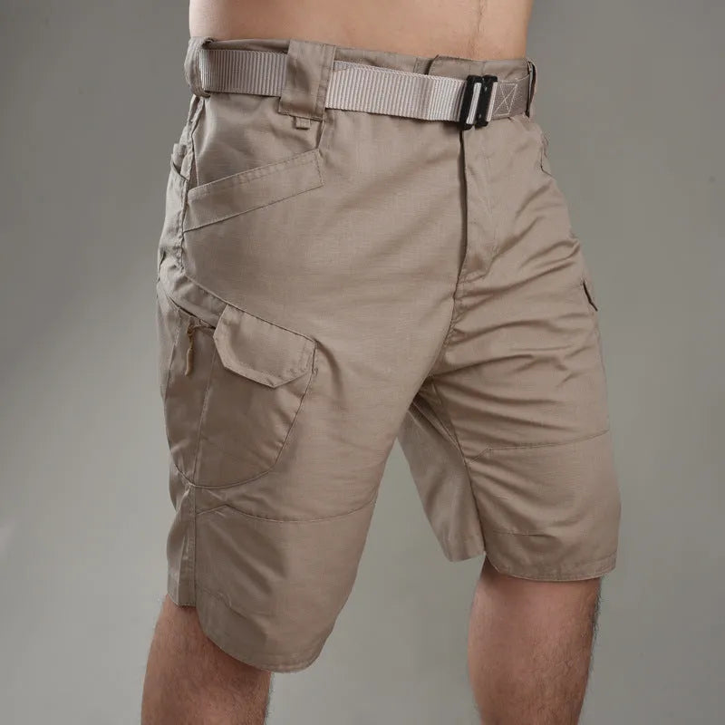 IX7 men's tactical shorts in cotton blend fabric shown in a camouflage colour, featuring a button fly.