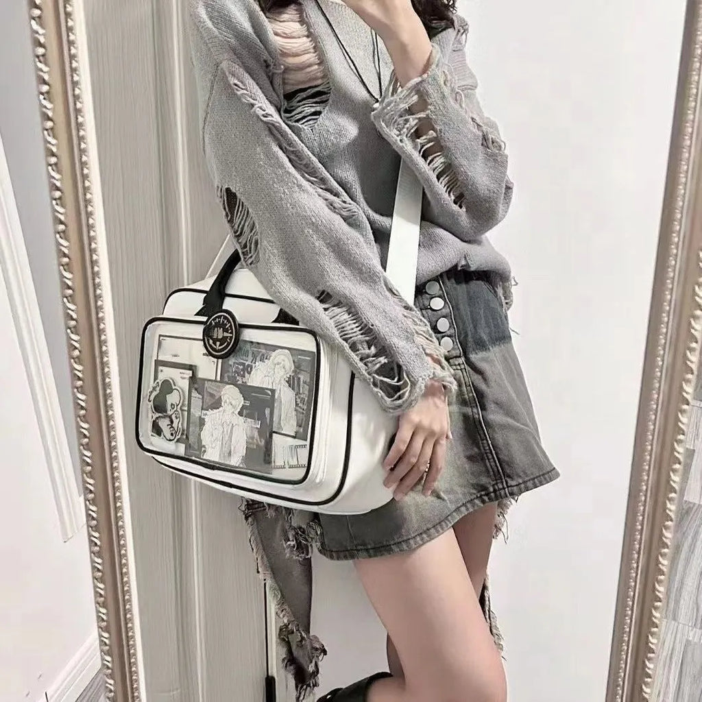 One-shoulder crossbody bag in PU, 42x24cm, white or black, with zipper change bag and outer pocket.