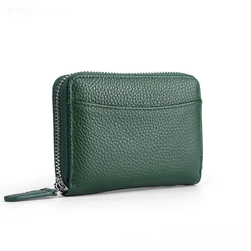 Genuine leather zipper coin purse in solid colour with anti-theft feature and sewing line detail.