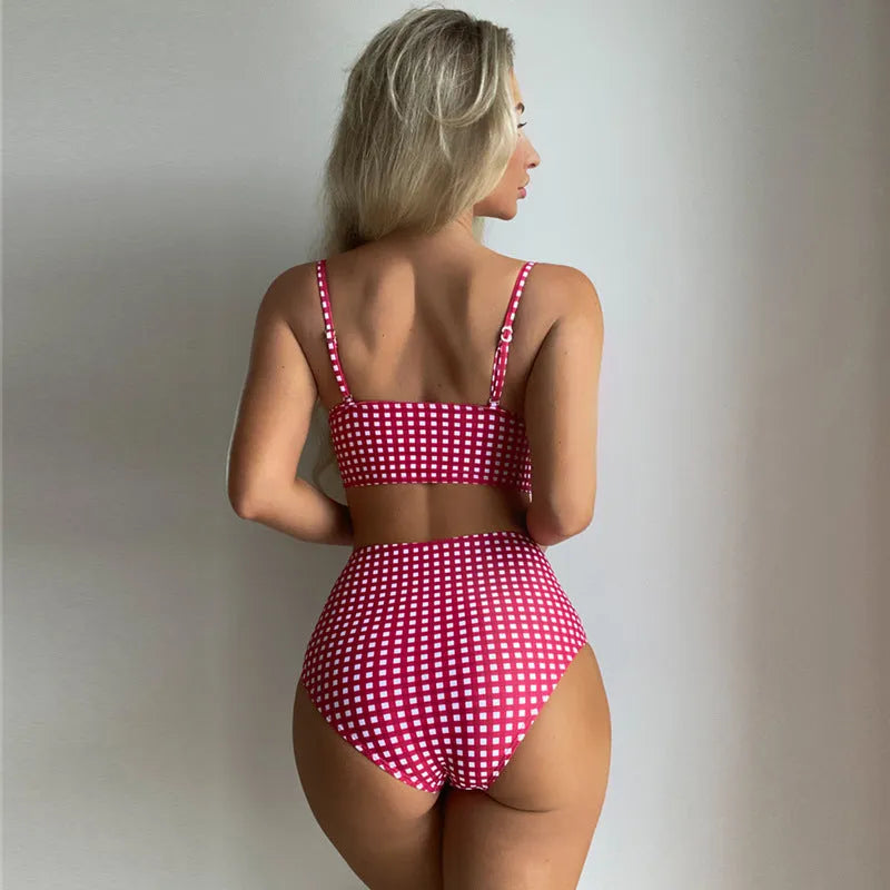 Women's rose red plaid print high-waisted bikini with split leg briefs and matching top.