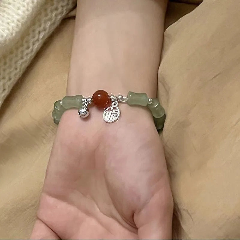 Chinese style glass bracelet with bamboo joint design elements in multiple colour options