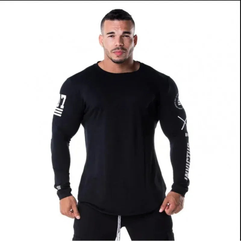 Men's milk silk long sleeve round neck fitness top with letter print in black, shown on a dark background