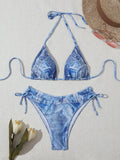 Denim blue women's bikini swimsuit with adjustable straps, shown as a complete set.