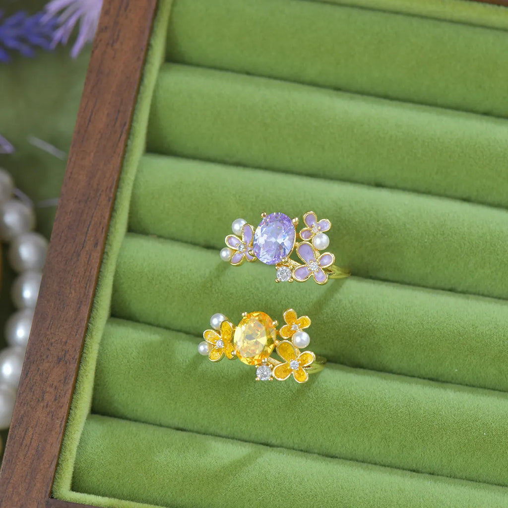 Women's flower pearl zircon open ring showing adjustable opening and electroplated metal construction