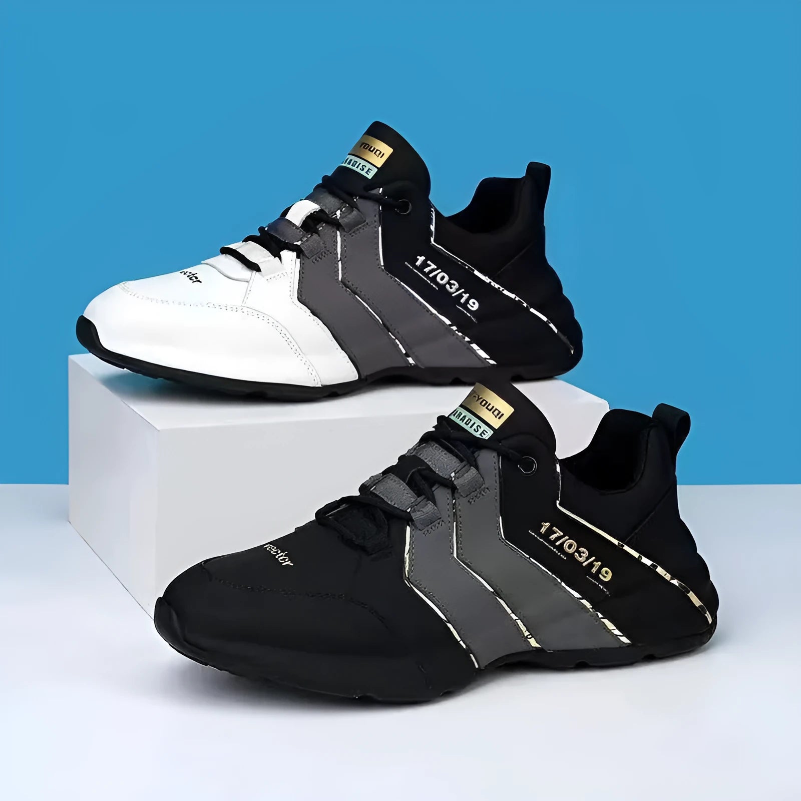 Casual low-top sneakers with a thick plastic sole and mesh lining in grey and black colourway.