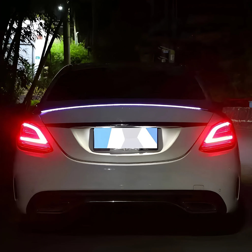 Automobile streamer tail LED turn signal strip showing red and colourful lighting patterns
