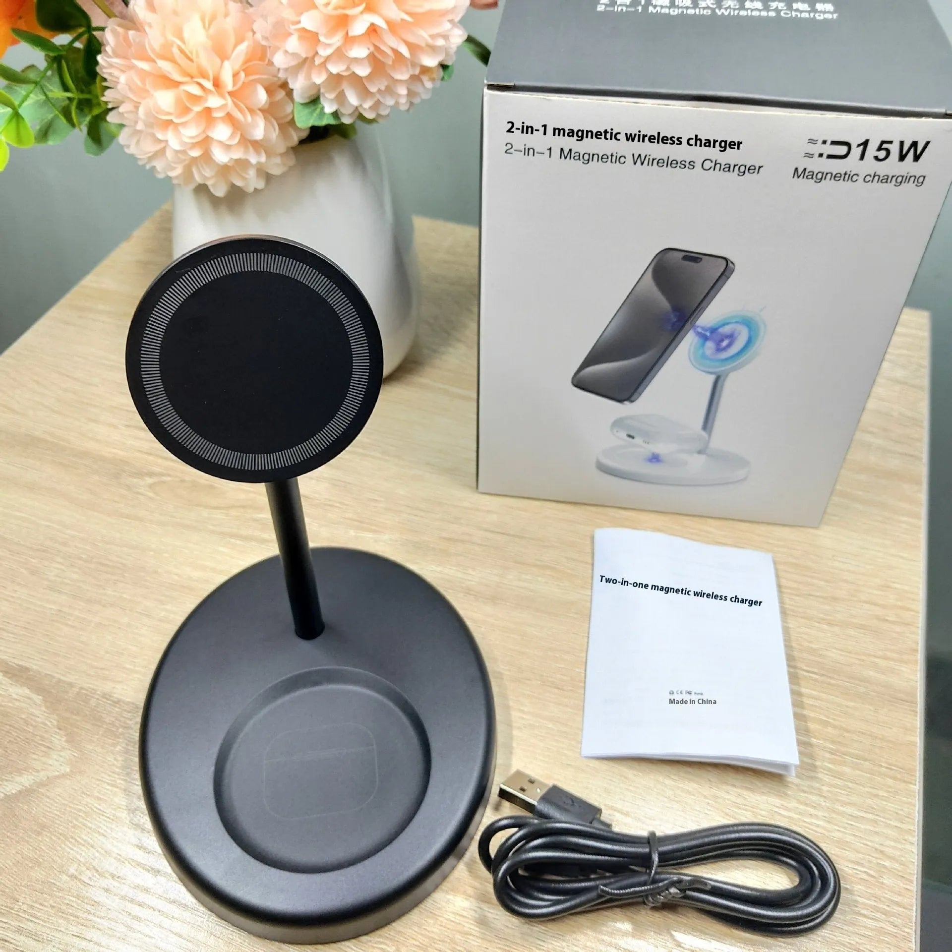 White vertical wireless charging station with cooling holes and smartphone in charging position