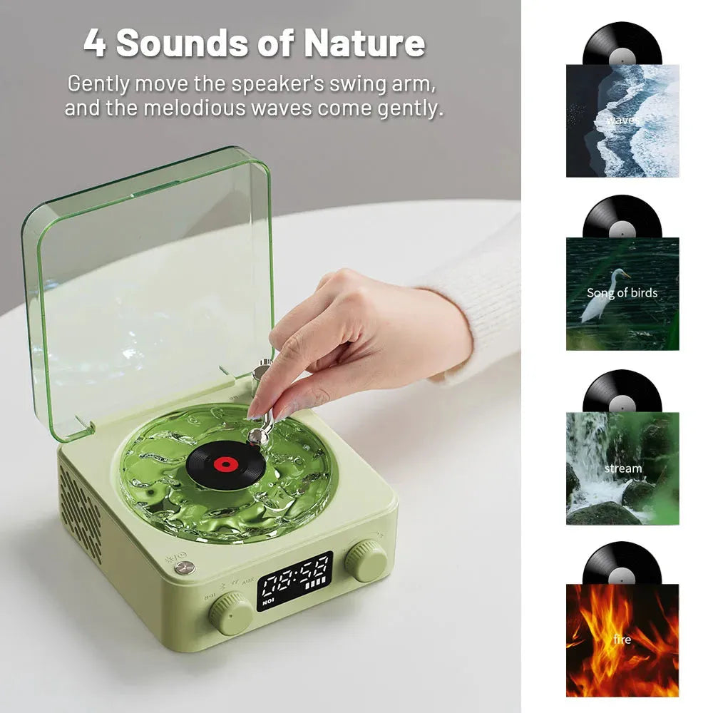 Retro turntable Bluetooth speaker with rotating transparent disc and RGB lighting effects
