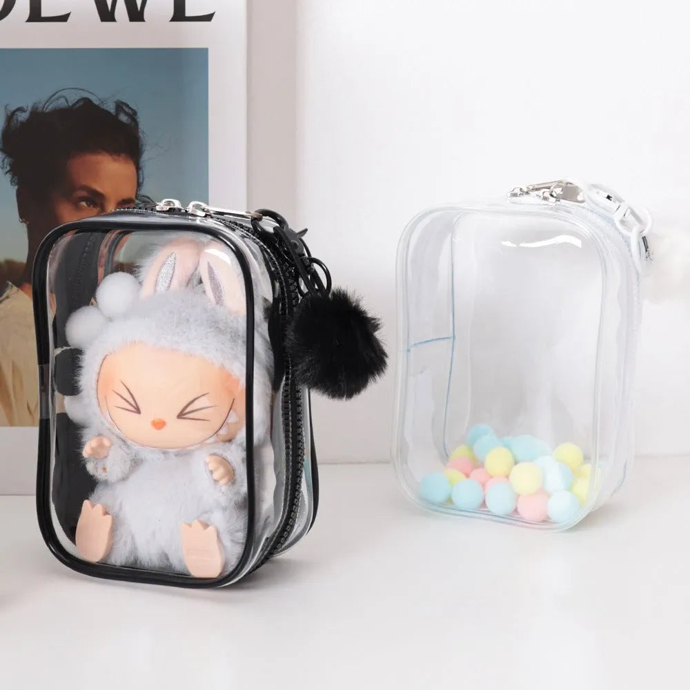 Three semi-transparent PVC makeup bags in black, pink and white colours showing cosmetic storage