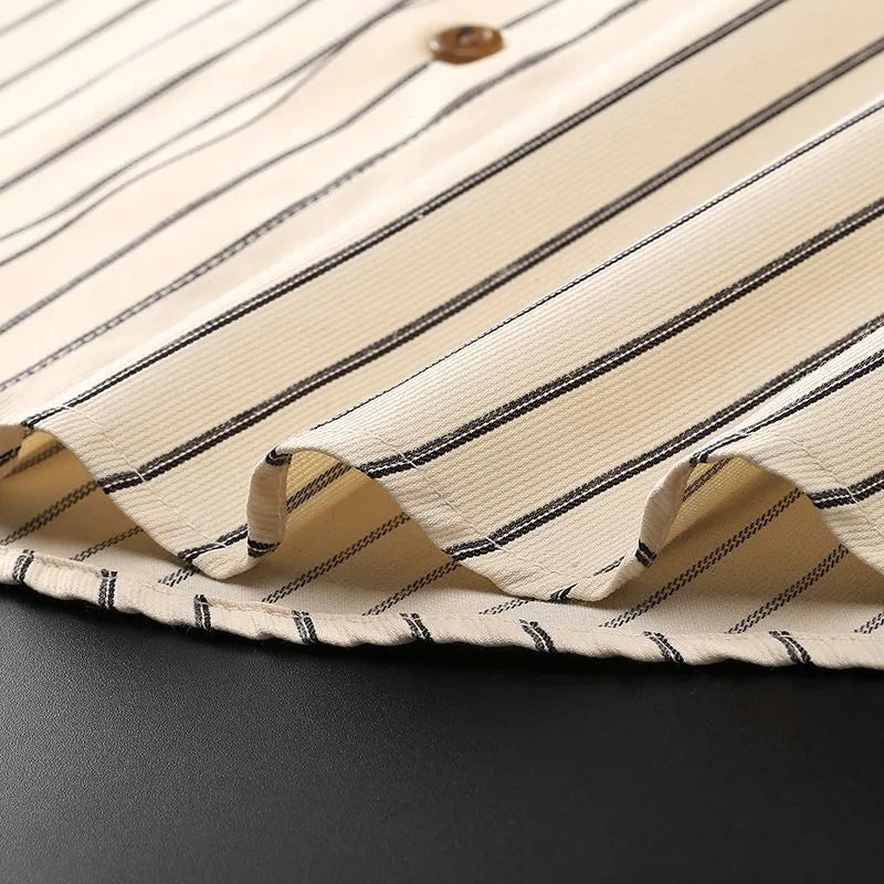 Coffee-coloured men's long-sleeved slim-fit business shirt with wool lining on a hanger