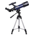 Dark blue children's astronomical telescope with monocular and tripod on a table.