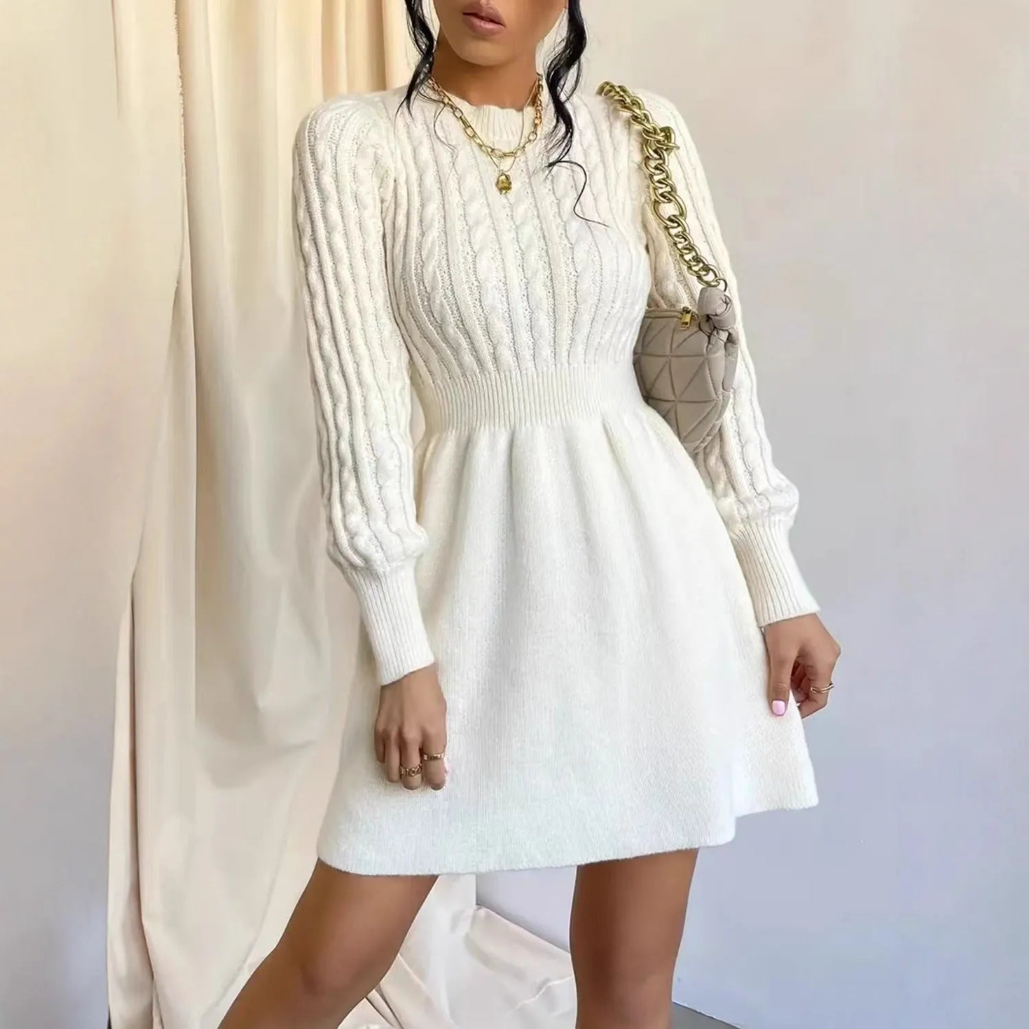 Korean-style waist-defining dress with round neck and twisted knit base in cream colour