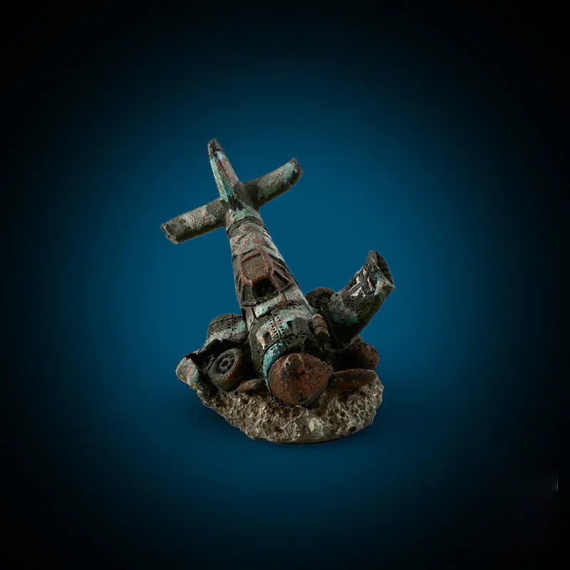 Resin aquarium ornament simulating aircraft wreckage, dimensions 8cm by 4.5cm by 4.5cm