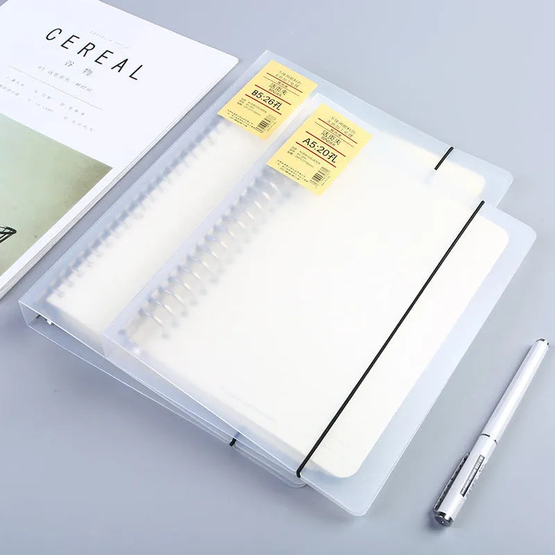 Class Notepad 26-hole A5 looped binder with PP matte cover on a desk.