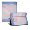 Silicone book-style iPad cover with dreamy painting style sailing motif, fits many iPad models