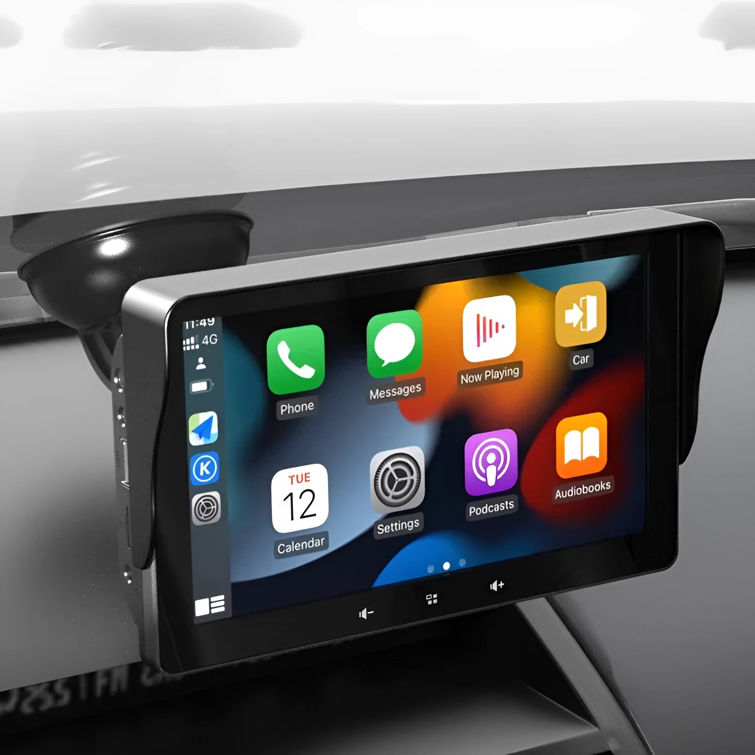 7 inch wireless CarPlay display mounted on a car windscreen with suction cup, showing iPhone apps on screen.