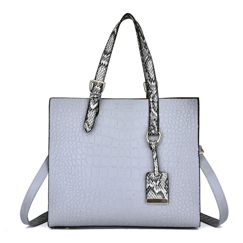 Women's solid colour diagonal cross body stone tote bag in black, 25x29x10cm, PU fabric with crocodile pattern