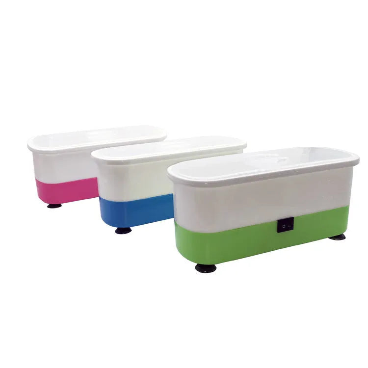 Blue plastic analog ultrasonic cleaner for glasses and contact lenses, 17x6x8 cm, with suction cups on a table
