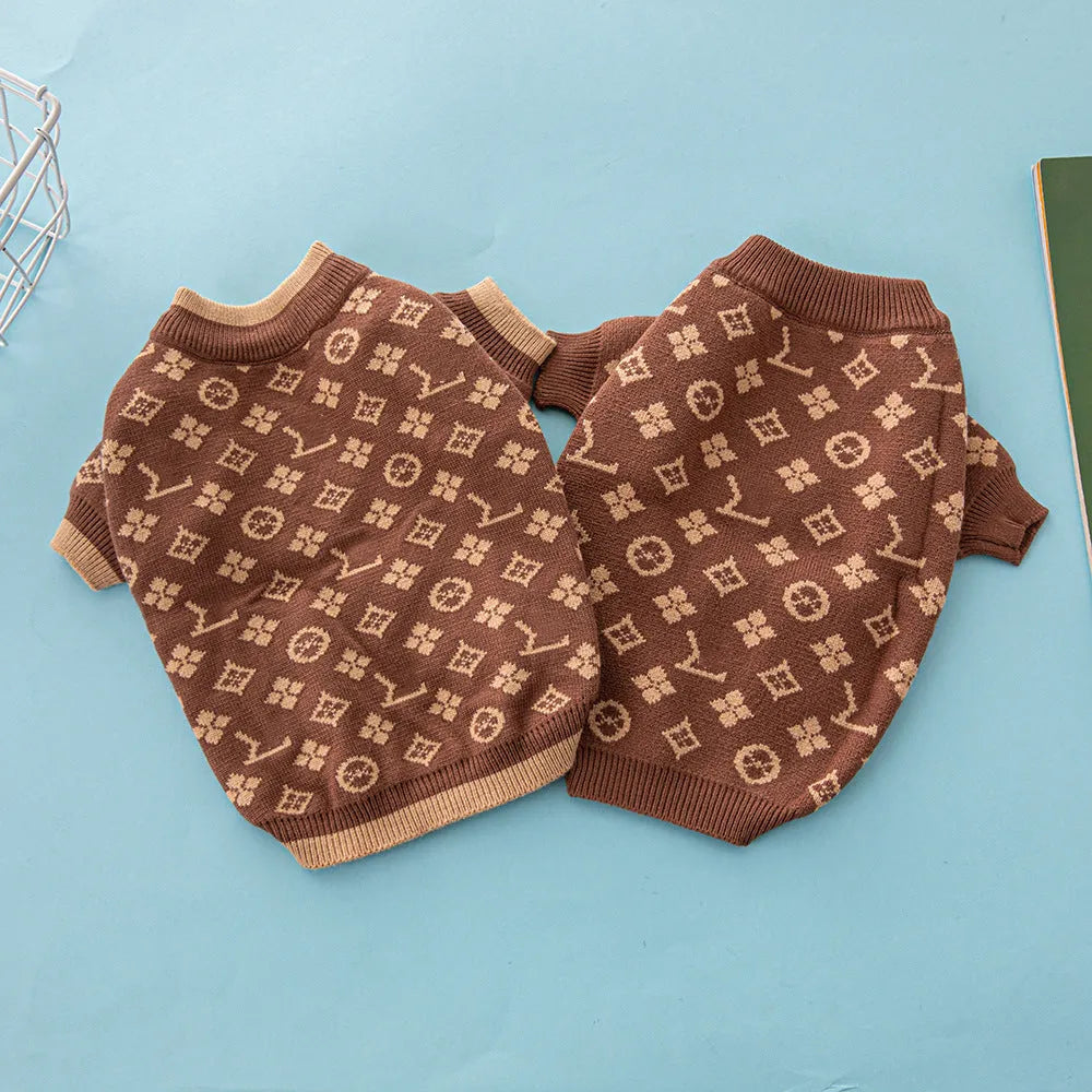 A thick wool dog sweater shown in a choice of monochrome or two-tone colours, sized from XS to XXL.