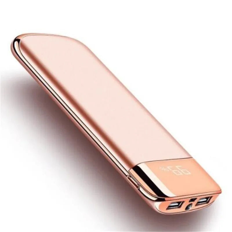 Portable power bank with LCD display showing battery percentage and two USB charging ports
