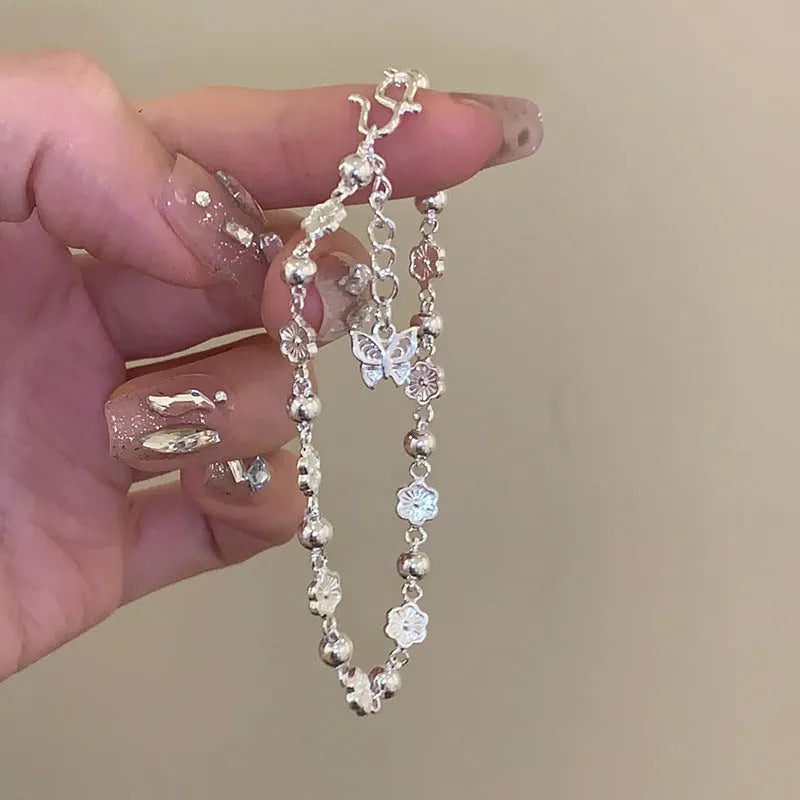 Women's alloy butterfly peach blossom bracelet with geometric rose motif and peach heart chain