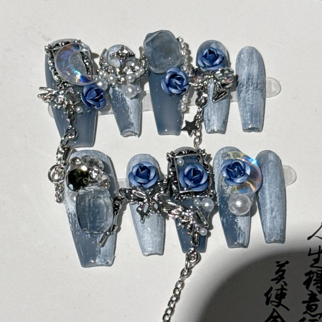 Evening manicure set with ornate rose pattern in heavy industry night blue colour