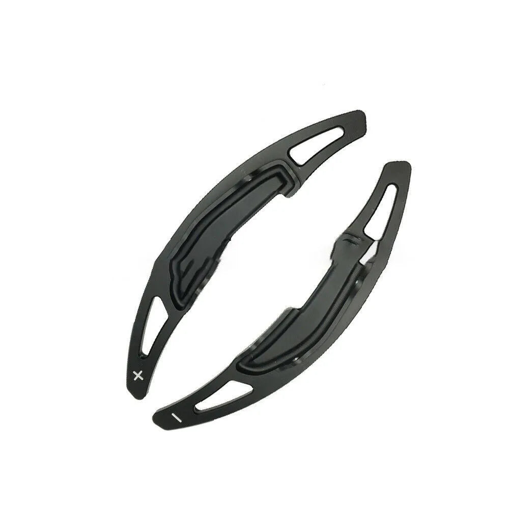 Pair of aluminium alloy paddle shift extenders for BMW M models on a black background