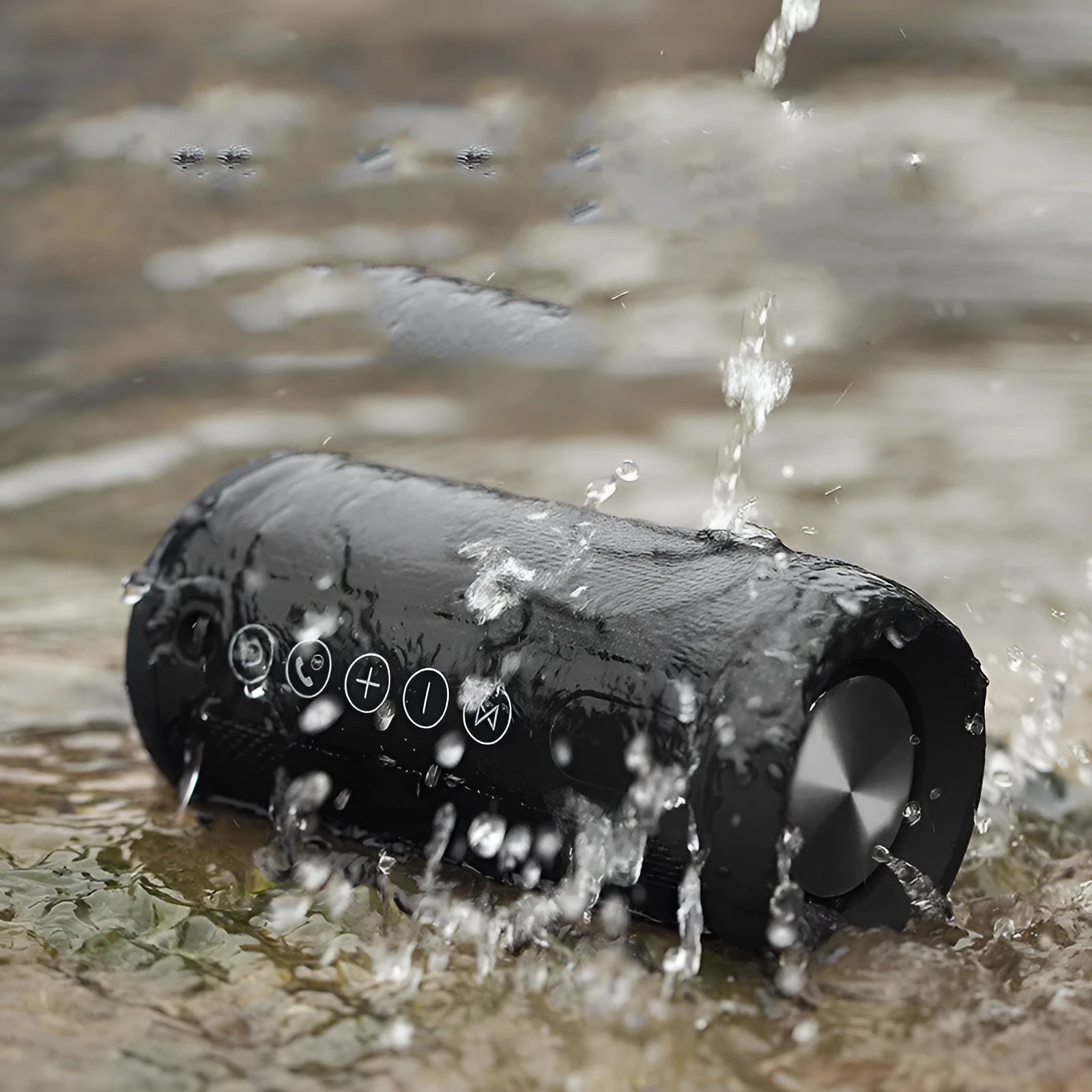 Black outdoor waterproof Bluetooth speaker with control buttons, shown in a garden setting.