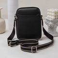 Solid colour crossbody phone bag for women in black, made from PU with an adjustable strap.