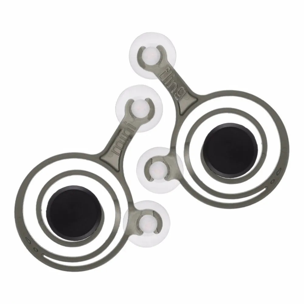 A pair of clear and black mini joysticks for mobile phone touch screen gaming.