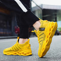Men's casual running shoes with mesh upper in black colour showing cross strap details and low-top design