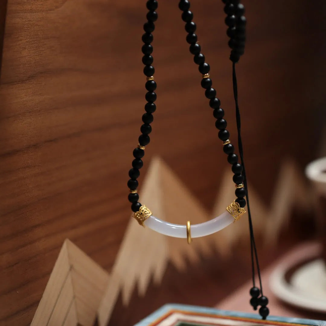 Matte black agate and white chalcedony necklace with 925 silver pendant in Chinese U-shaped design