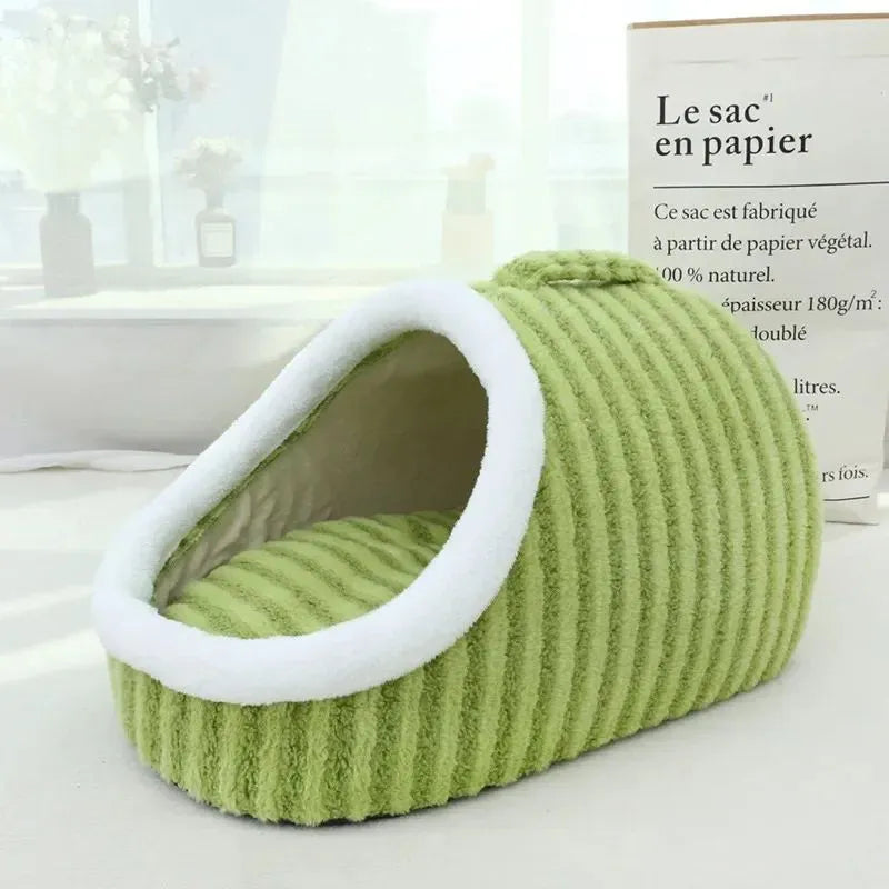 Striped thickened 3D dog bed with enclosed hole design and removable sponge mattress in blue, green, pink, or yellow.