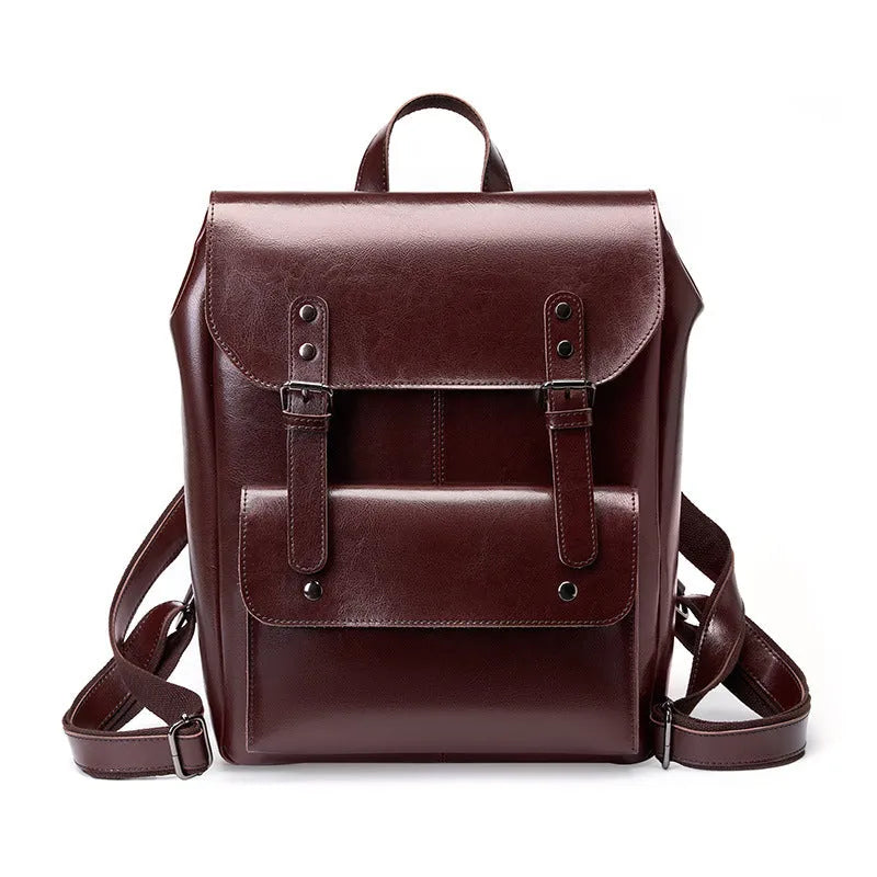 Black cowhide leather laptop backpack for women with a structured, hard-sided design.