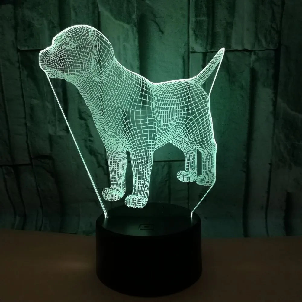 Dog-shaped USB mood lamp showing 7 colours with touch and remote control on a bedside table