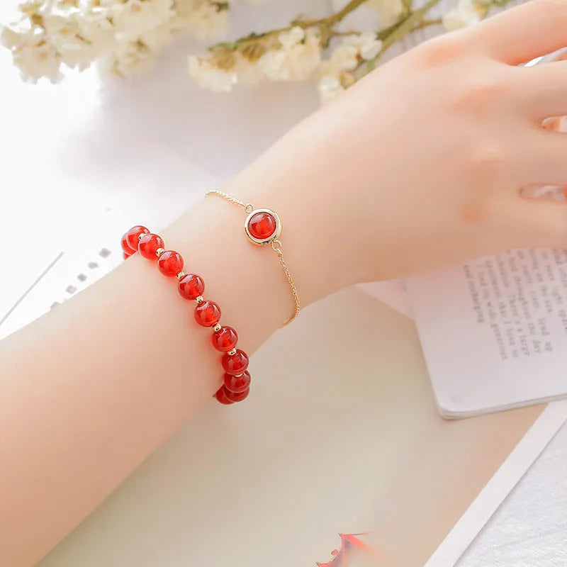 Double-layer women's bracelet with crystal beads and lucky charms in gold electroplated finish