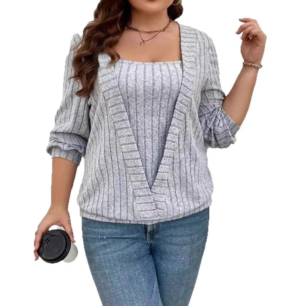 Woman wearing a solid colour purple rib knit V-neck long sleeve false two-piece suit with a loose fit.