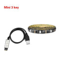 Flexible LED strip light bent into a curve, showing individual LEDs and adhesive backing, against a dark background.