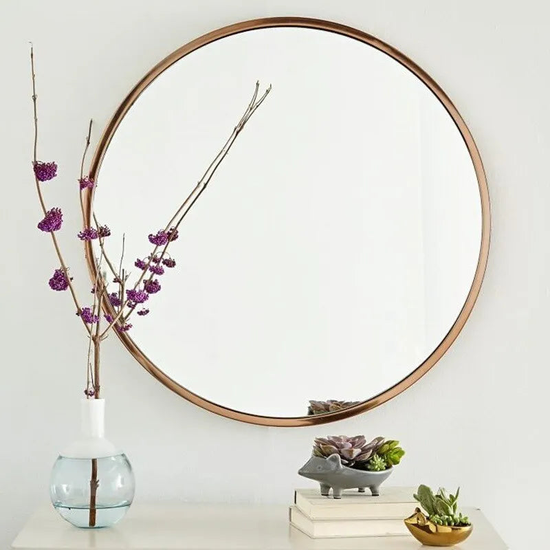 Round iron-framed bathroom wall mirror in black, gold, or white, shown in 30cm and 60cm sizes.