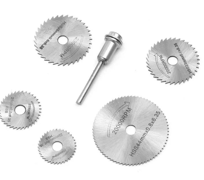 Six circular saw blades with mandrel on white background showing different diameters