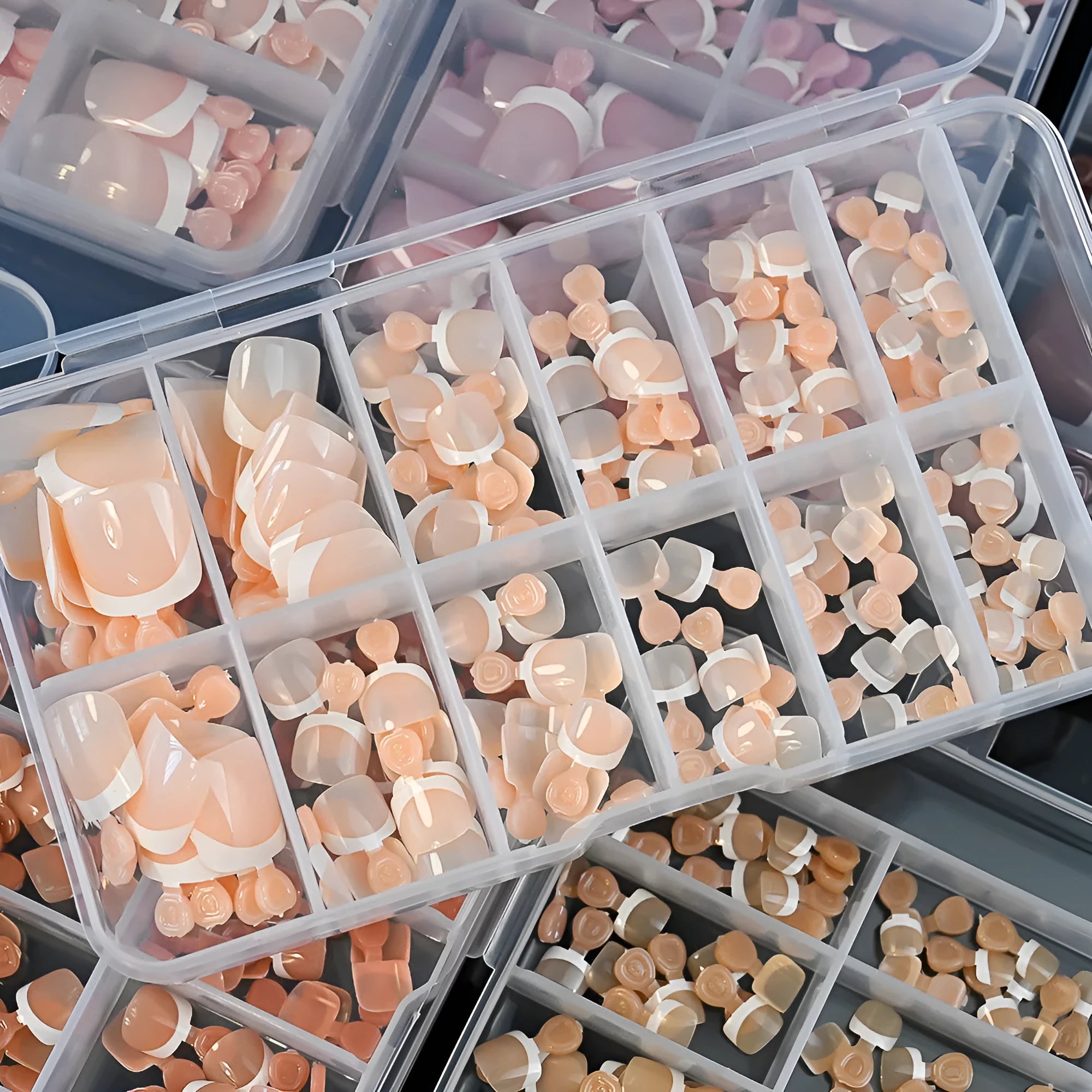 Box of 120 French style nude square artificial toe nail pieces in nine colour shades