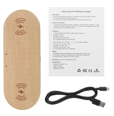 Wood wireless charger with natural bamboo finish showing Qi smartphone charging on top